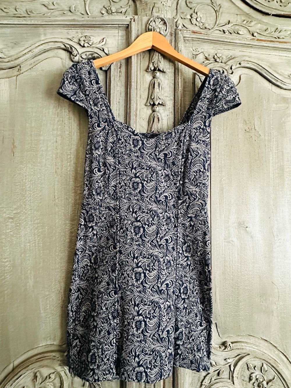 Sweetheart with cap sleeves and open back.